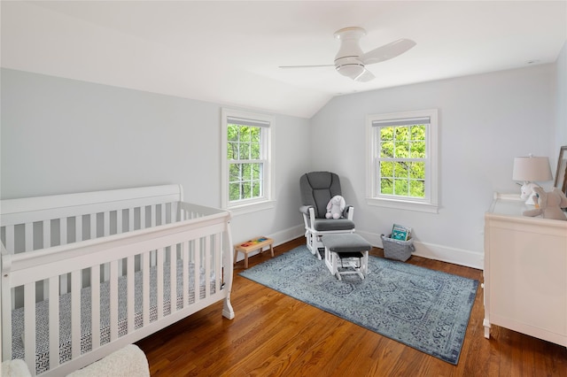 58 Spring Ln, Chappaqua, NY 10514 - bedroom with vaulted ceiling, multiple windows, wood finished floors, ceiling fan, and baseboards