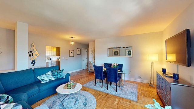 living room featuring light parquet floors