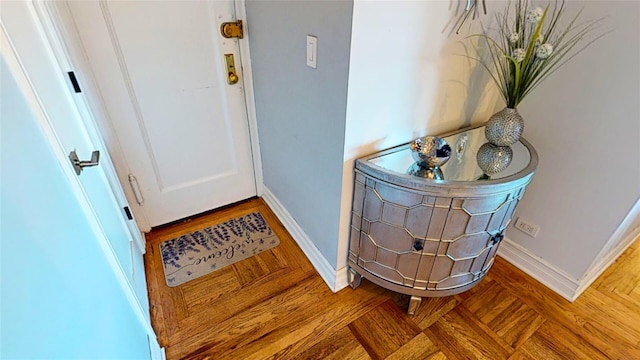 interior space featuring parquet flooring