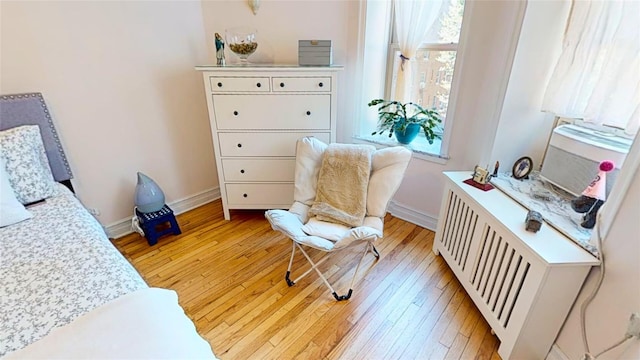 bedroom with light hardwood / wood-style floors