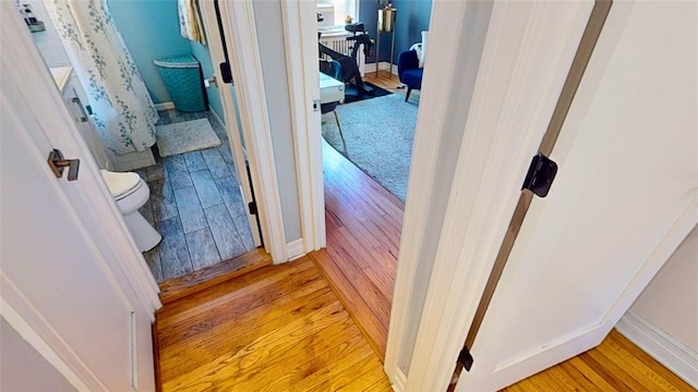 hallway featuring light wood-type flooring