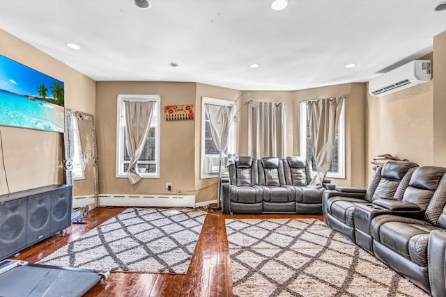 living room featuring a baseboard radiator, an AC wall unit, and hardwood / wood-style floors