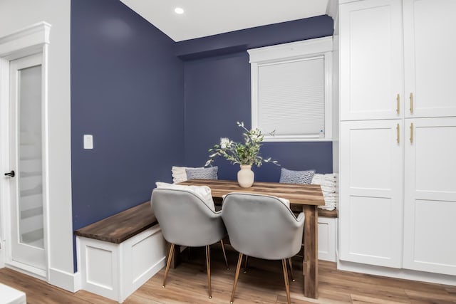 dining area featuring breakfast area and light hardwood / wood-style floors