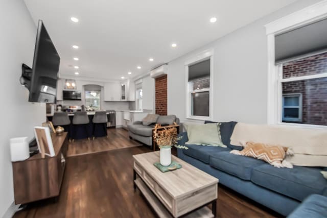 living room featuring dark hardwood / wood-style floors