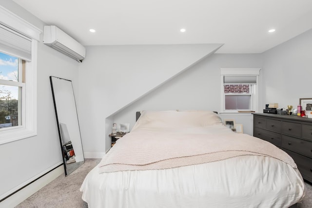 carpeted bedroom with a baseboard radiator and a wall mounted AC