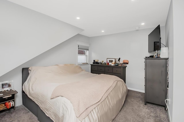 bedroom featuring light carpet