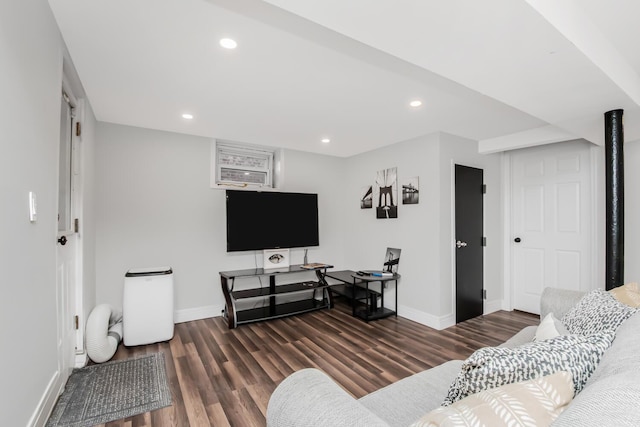 living room with dark hardwood / wood-style floors