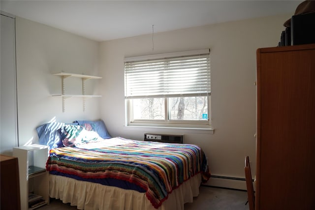334 Central Park Ave Unit H8, Scarsdale, NY 10583 - carpeted bedroom featuring baseboard heating and a wall unit AC