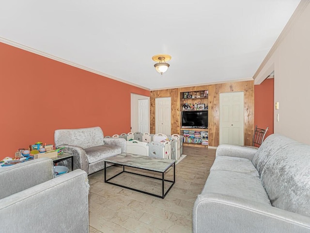 living room featuring crown molding