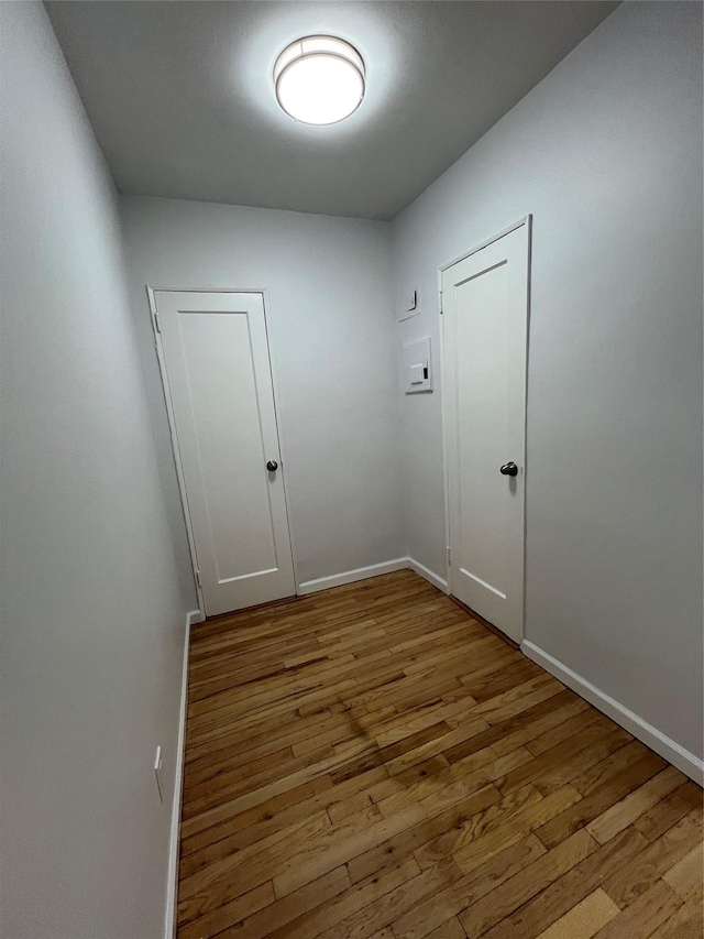 spare room featuring light wood-type flooring