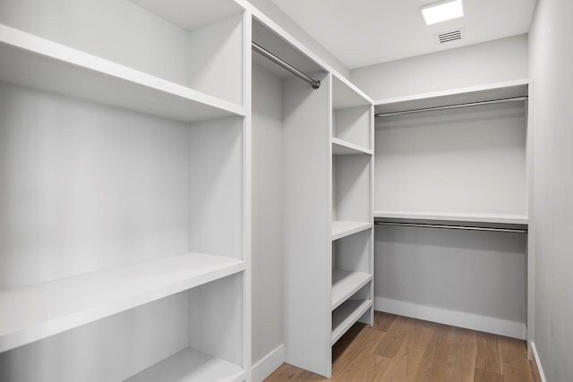 245 Mill Rd, Westhampton Beach, NY 11978 - spacious closet with wood finished floors
