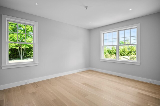 245 Mill Rd, Westhampton Beach, NY 11978 - empty room featuring wood finished floors, baseboards, and recessed lighting