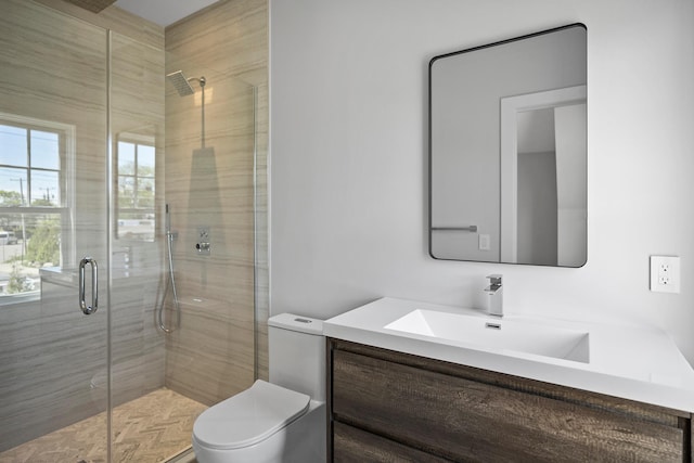 245 Mill Rd, Westhampton Beach, NY 11978 - full bathroom with vanity, a stall shower, and toilet