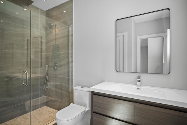 245 Mill Rd, Westhampton Beach, NY 11978 - bathroom featuring toilet, vanity, and a stall shower