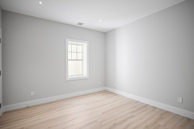 245 Mill Rd, Westhampton Beach, NY 11978 - empty room featuring light wood finished floors, baseboards, and recessed lighting