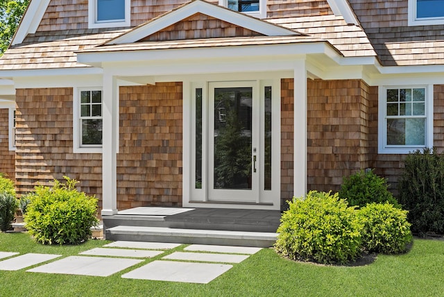 245 Mill Rd, Westhampton Beach, NY 11978 - view of exterior entry featuring a porch