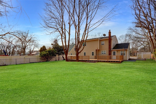 view of yard with a deck