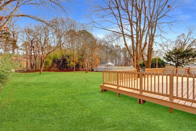 view of yard featuring a deck