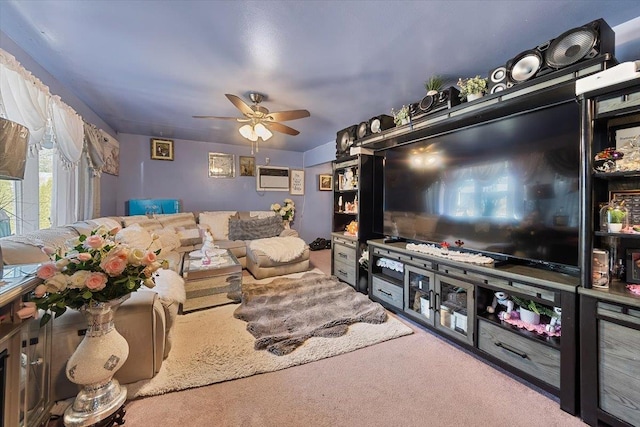 carpeted living room featuring a wall mounted air conditioner and ceiling fan