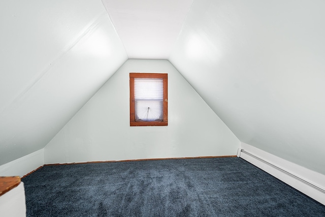 bonus room featuring vaulted ceiling, carpet, and baseboard heating