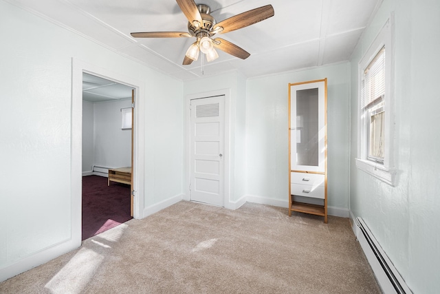 unfurnished bedroom featuring ceiling fan, a baseboard radiator, and light colored carpet