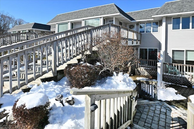 view of snow covered deck