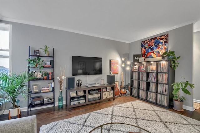 living room with ornamental molding and dark wood-type flooring