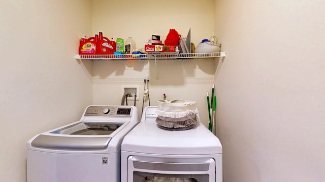 laundry room with laundry area and washer and dryer