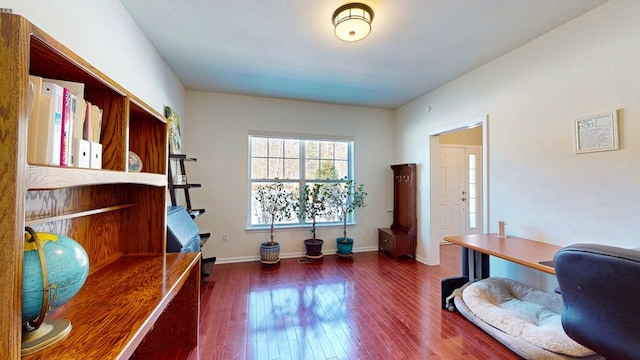 office space featuring dark wood-style floors and baseboards