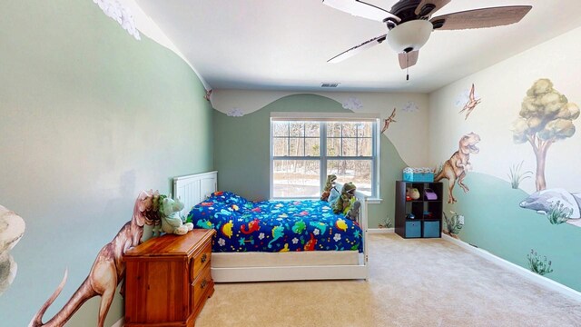 bedroom with baseboards, a ceiling fan, visible vents, and light colored carpet