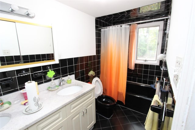 full bathroom with tile patterned floors, toilet, tile walls, vanity, and shower / bath combination with curtain