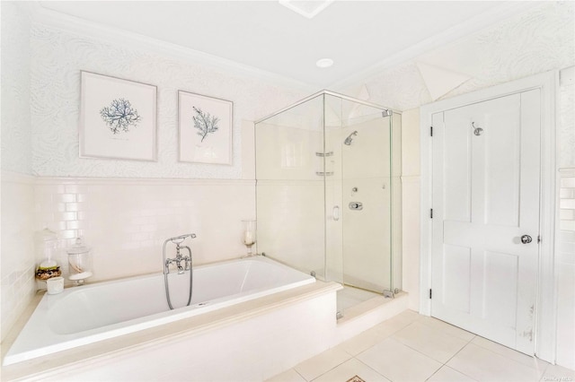 bathroom with shower with separate bathtub, ornamental molding, and tile patterned floors
