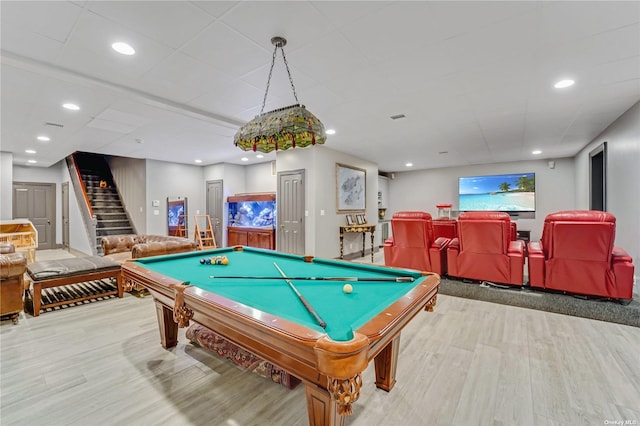game room with pool table and light hardwood / wood-style floors