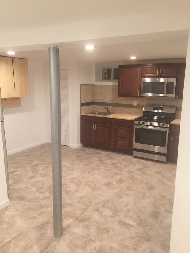 kitchen featuring sink and stainless steel appliances