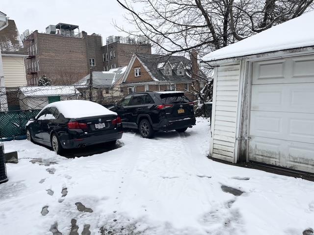 view of yard covered in snow