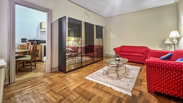 living room with parquet flooring