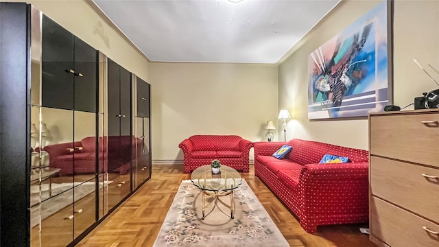 living room featuring parquet flooring