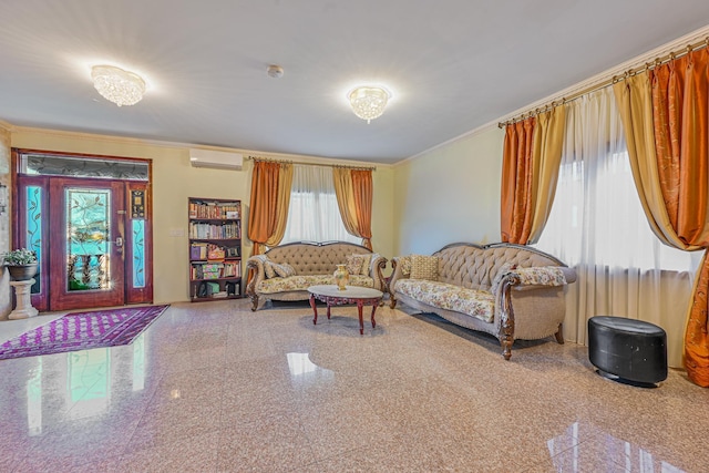 living area featuring a wall unit AC, granite finish floor, and crown molding