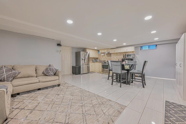 dining area featuring baseboards, light tile patterned floors, and recessed lighting