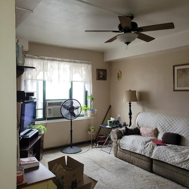 carpeted living room featuring cooling unit and ceiling fan