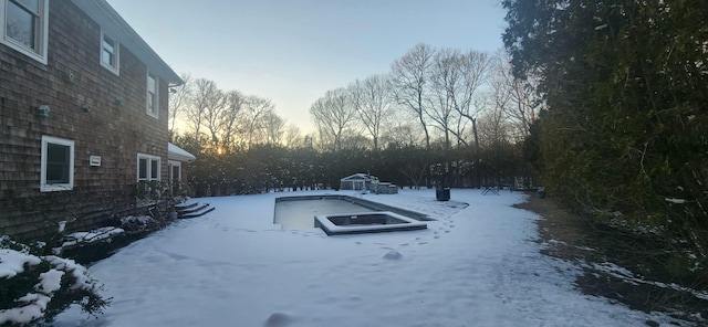 view of yard covered in snow