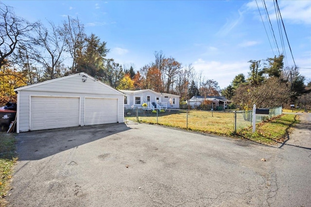 garage with a lawn