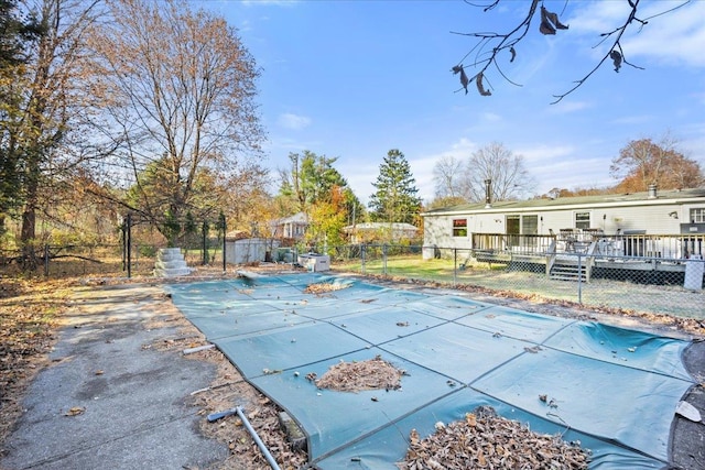 view of pool featuring a deck