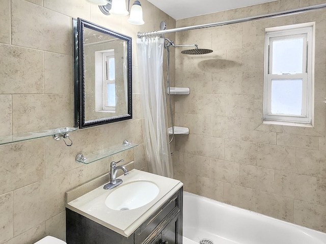 bathroom with vanity and shower / tub combo with curtain