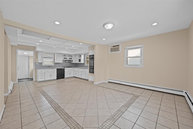 unfurnished living room featuring light tile patterned floors, a baseboard radiator, sink, and a wall mounted AC