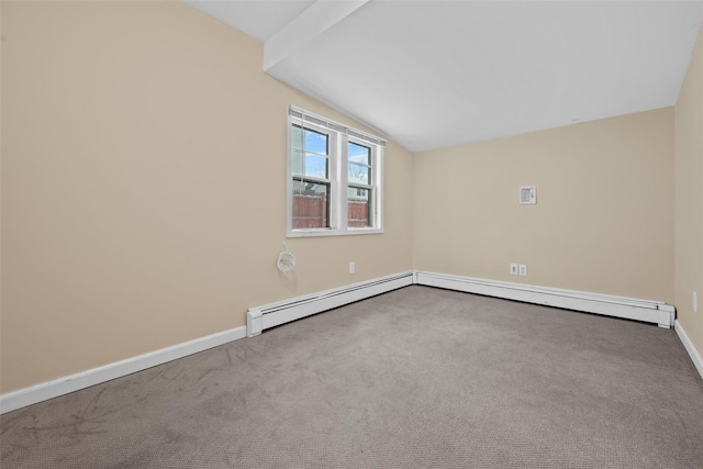 spare room featuring vaulted ceiling, carpet floors, and a baseboard radiator