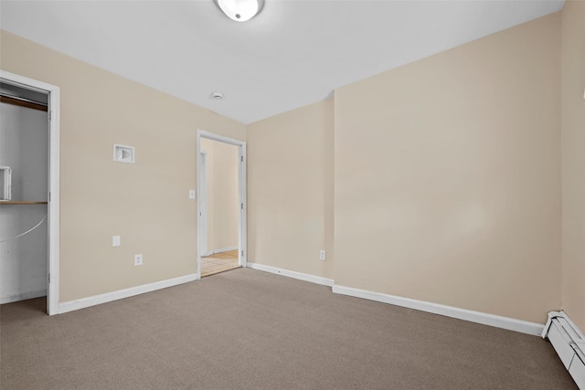 unfurnished bedroom with carpet and baseboard heating