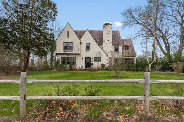 320 Putnam Ave, Port Chester, NY 10573 - tudor house with a chimney and a front lawn