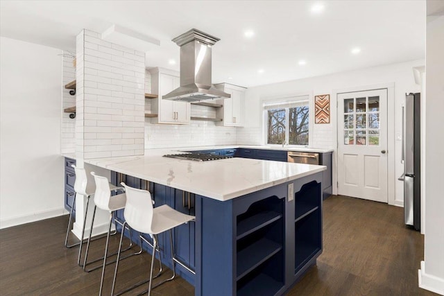 320 Putnam Ave, Port Chester, NY 10573 - kitchen featuring open shelves, island exhaust hood, stainless steel appliances, white cabinets, and a peninsula