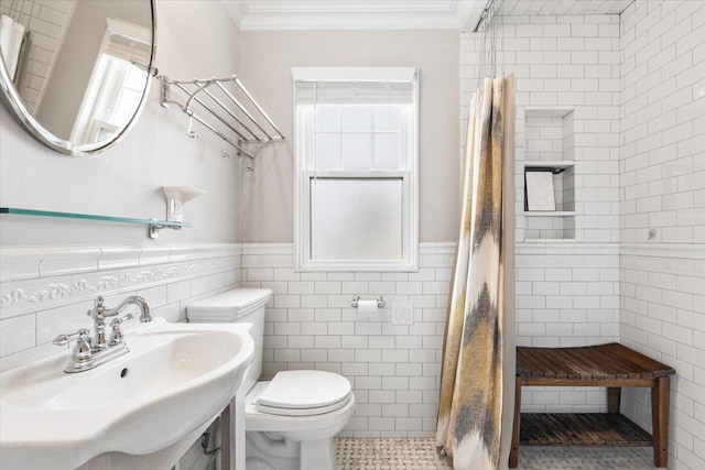 320 Putnam Ave, Port Chester, NY 10573 - bathroom with toilet, a sink, a stall shower, ornamental molding, and wainscoting